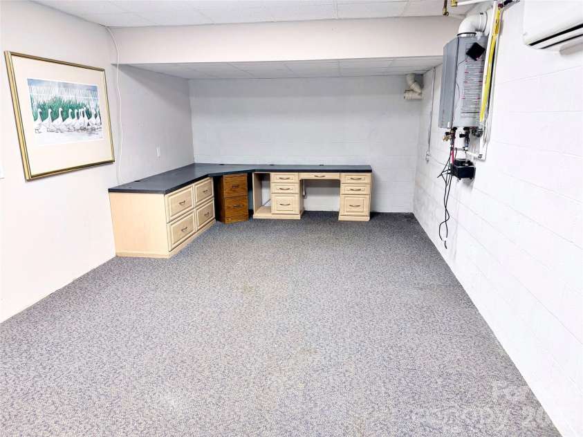 7605 Keating Drive, Oak Ridge, NC 27310.  MLS# CAR4418989, YatesRealty ID 35792. Basement Office