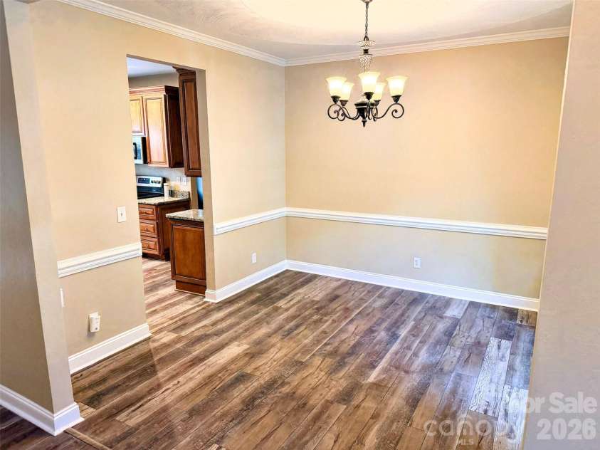 7605 Keating Drive, Oak Ridge, NC 27310.  MLS# CAR4418989, YatesRealty ID 35792. Dining Room