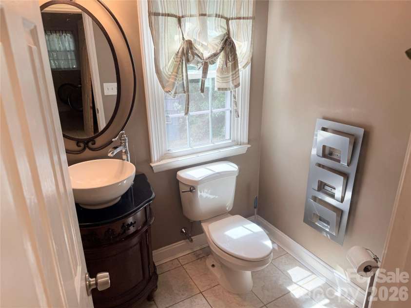7605 Keating Drive, Oak Ridge, NC 27310.  MLS# CAR4418989, YatesRealty ID 35792. Half-Bathroom