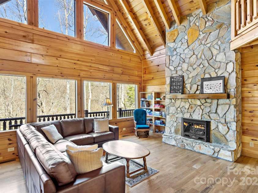 200 Blue Gill Drive, Lake Lure, NC 28746.  MLS# CAR4231611, YatesRealty ID 3580. Light and Bright, spacious Livingroom with Stone fireplace