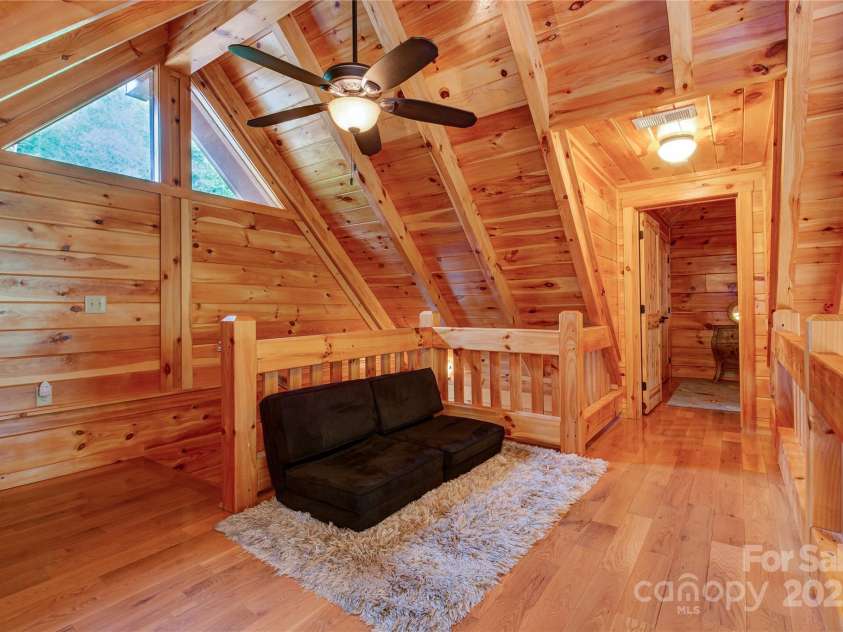 200 Blue Gill Drive, Lake Lure, NC 28746.  MLS# CAR4231611, YatesRealty ID 3580. Loft between the two upper-level bedrooms