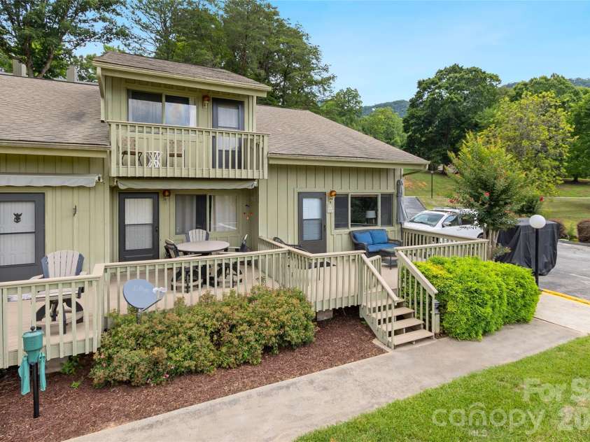 135 Fox Run Boulevard, Lake Lure, NC 28746.  MLS# CAR4398642, YatesRealty ID 35802. West facing deck for enjoying sunsets