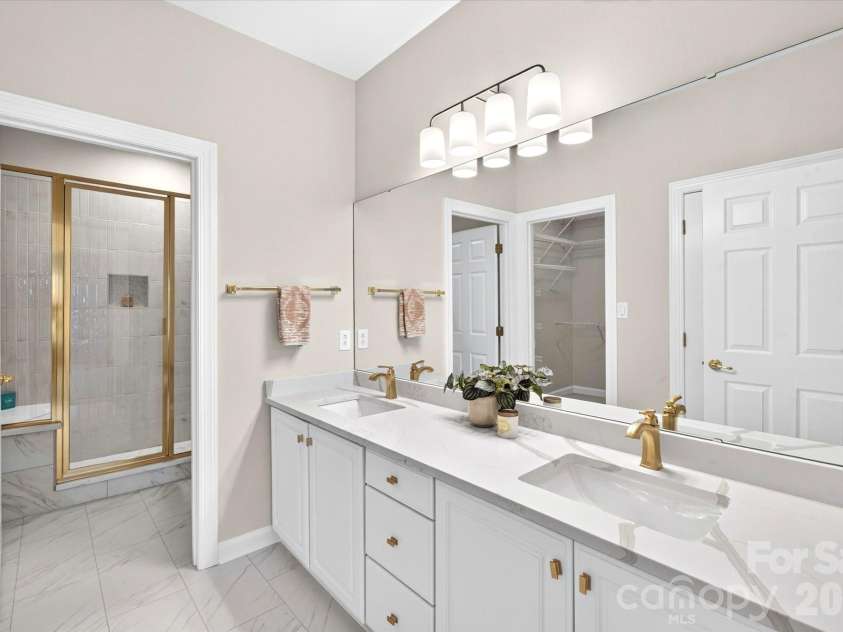 8363 Olde Troon Drive, Charlotte, NC 28277.  MLS# CAR4399432, YatesRealty ID 35812. Completely remodeled primary bath