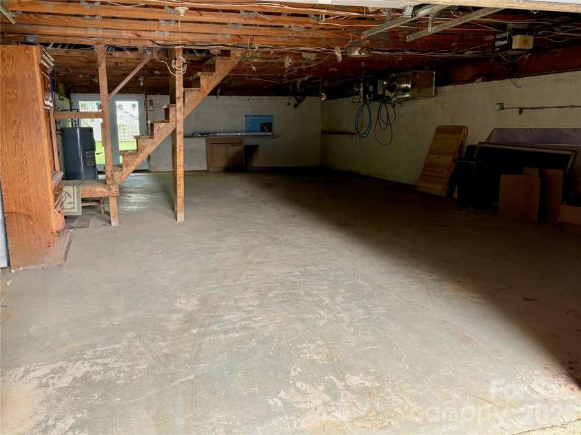 65 Spencer Street, Clyde, NC 28721.  MLS# CAR4391971, YatesRealty ID 35818. Ample Storage!