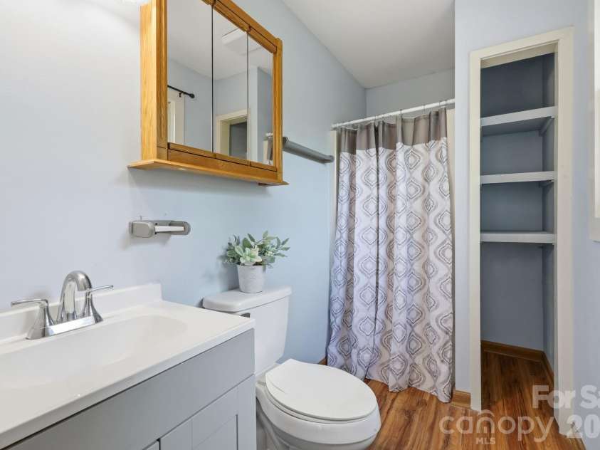 65 Spencer Street, Clyde, NC 28721.  MLS# CAR4391971, YatesRealty ID 35818. Ensuite Bathroom
