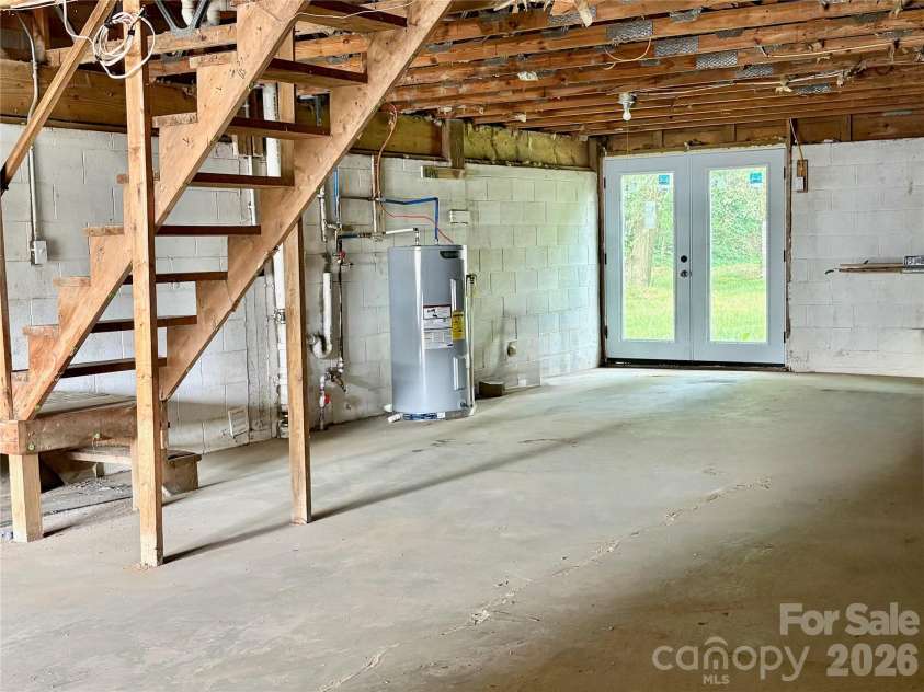 65 Spencer Street, Clyde, NC 28721.  MLS# CAR4391971, YatesRealty ID 35818. Garage Workshop