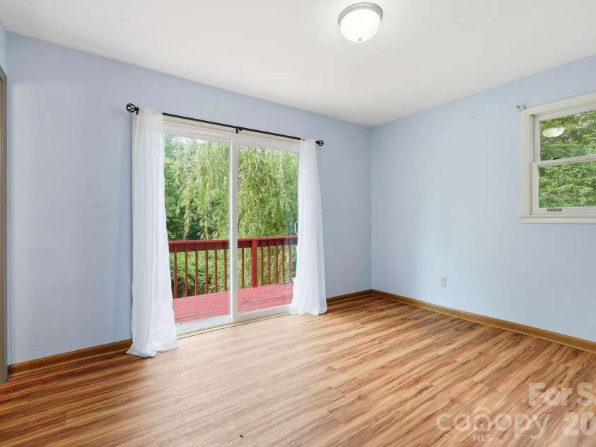 65 Spencer Street, Clyde, NC 28721.  MLS# CAR4391971, YatesRealty ID 35818. Primary Bedroom