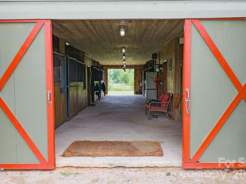 2545 Rocky River Road, Lancaster, SC 29720.  MLS# CAR4394722, YatesRealty ID 35819. 8 stall center aisle barn