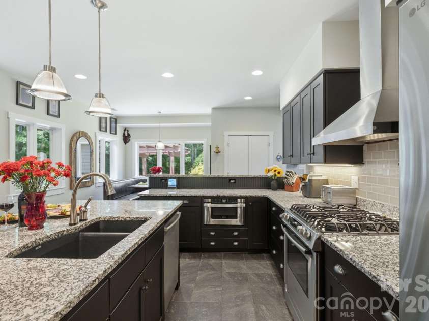 2545 Rocky River Road, Lancaster, SC 29720.  MLS# CAR4394722, YatesRealty ID 35819. Bosch stainless steel appliances, gas range & Sharp microwave drawer