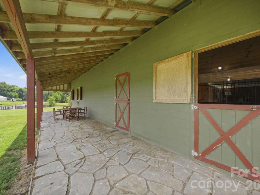 2545 Rocky River Road, Lancaster, SC 29720.  MLS# CAR4394722, YatesRealty ID 35819. Covered Patio, stalls with dutch doors