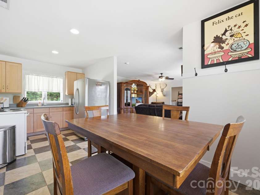2545 Rocky River Road, Lancaster, SC 29720.  MLS# CAR4394722, YatesRealty ID 35819. Full kitchen, living/play room overlooking pool