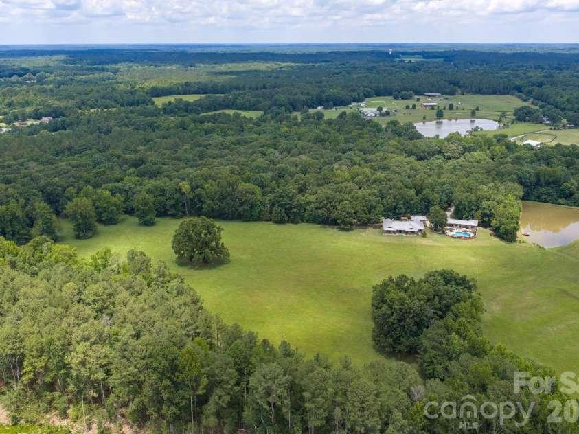 2545 Rocky River Road, Lancaster, SC 29720.  MLS# CAR4394722, YatesRealty ID 35819. Hay fields produce approximately 800 sq bales- spring cut