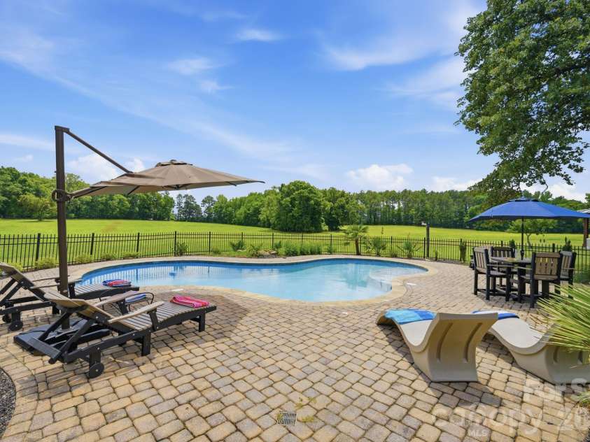 2545 Rocky River Road, Lancaster, SC 29720.  MLS# CAR4394722, YatesRealty ID 35819. Pool refurbished with new pebble-tec