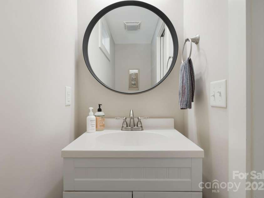 14 3rd Street, Asheville, NC 28803.  MLS# CAR4297140, YatesRealty ID 3582. Half bathroom on main level