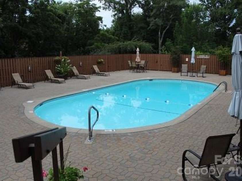 301 Crowfields Lane, Asheville, NC 28803.  MLS# CAR4399895, YatesRealty ID 35820. Heated Pool