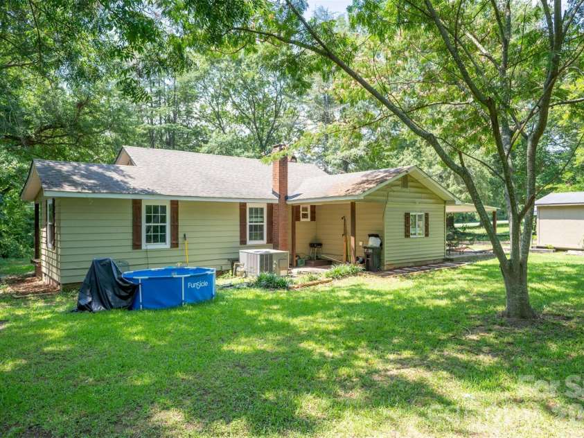 7193 Kershaw Camden Highway, Kershaw, SC 29067.  MLS# CAR4399543, YatesRealty ID 35821. Back of Home
