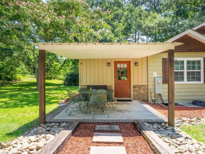 7193 Kershaw Camden Highway, Kershaw, SC 29067.  MLS# CAR4399543, YatesRealty ID 35821. Covered Patio