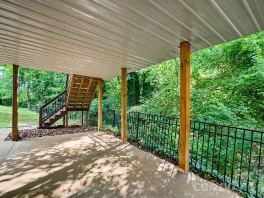 4013 Carlton Drive, Claremont, NC 28610.  MLS# CAR4381892, YatesRealty ID 35823. Walkout basement patio
