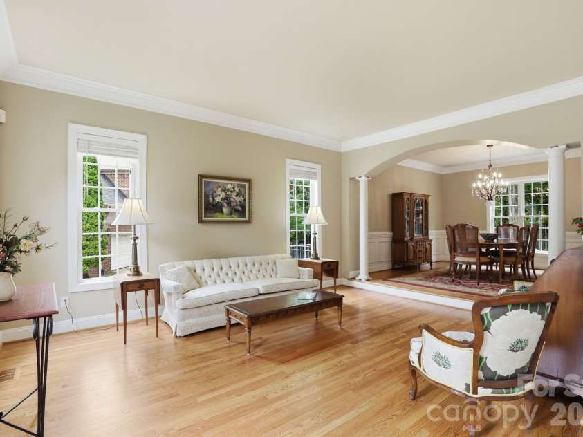 7011 Edenderry Drive, Charlotte, NC 28270.  MLS# CAR4397470, YatesRealty ID 35827. Step-down living room