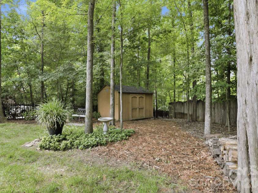 7011 Edenderry Drive, Charlotte, NC 28270.  MLS# CAR4397470, YatesRealty ID 35827. Storage shed