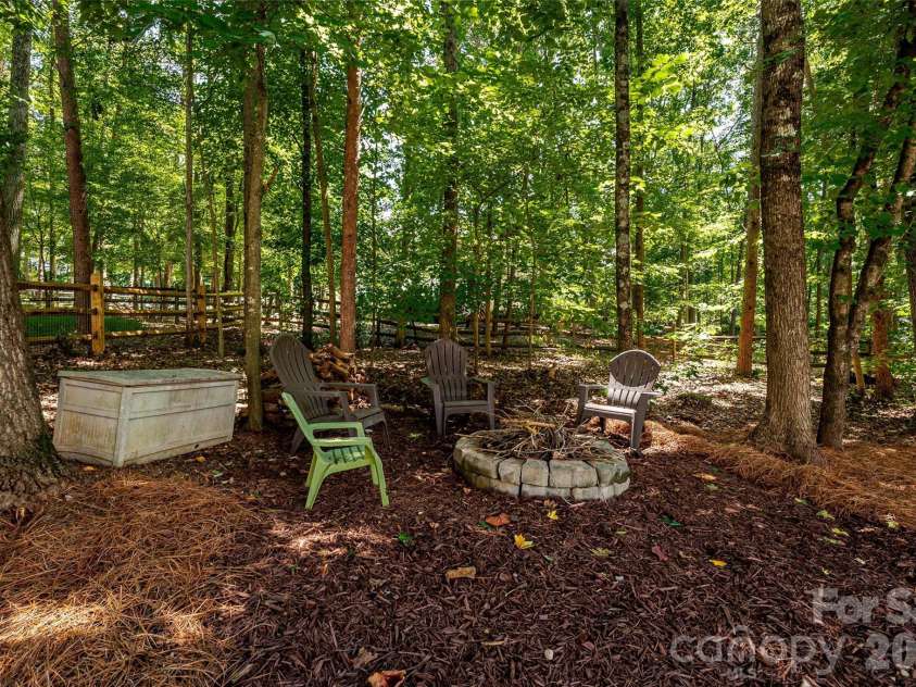 14427 Maclauren Lane, Huntersville, NC 28078.  MLS# CAR4400774, YatesRealty ID 35836. Firepit