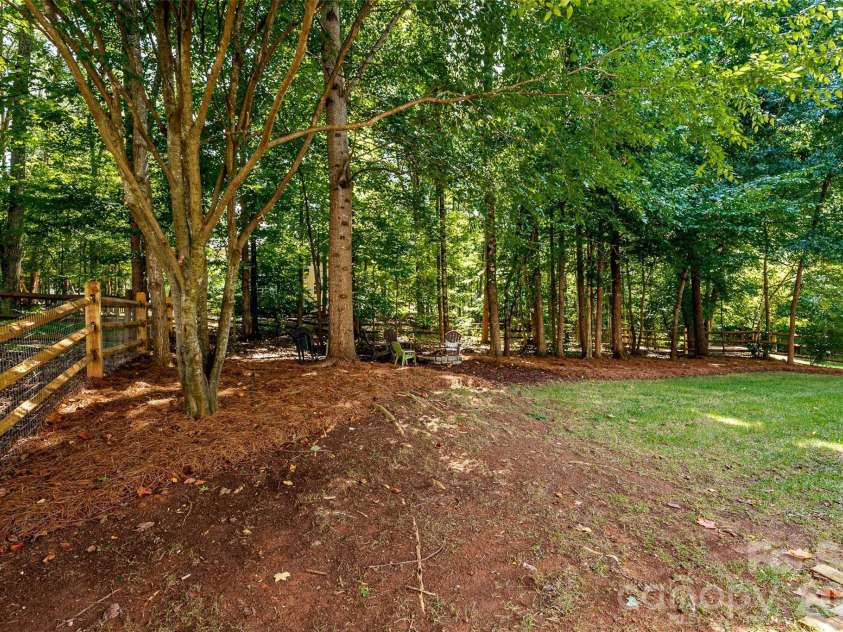 14427 Maclauren Lane, Huntersville, NC 28078.  MLS# CAR4400774, YatesRealty ID 35836. Wooded backyard