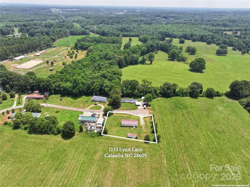 1133 Lynn Lane, Catawba, NC 28609.  MLS# CAR4275480, YatesRealty ID 3584. Back yard with approximate lot lines 