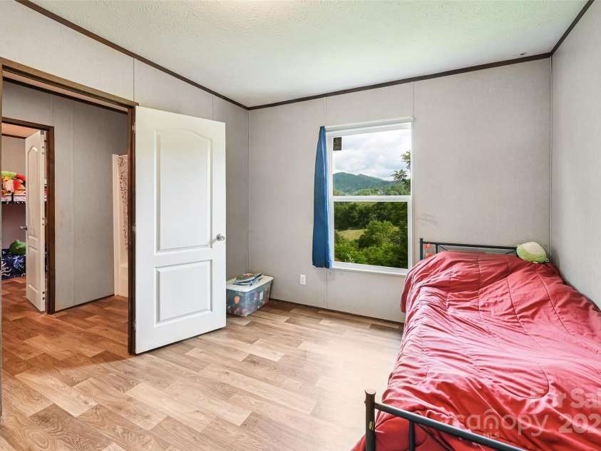 208 Stillwater Springs Road, Burnsville, NC 28714.  MLS# CAR4260579, YatesRealty ID 3584. 