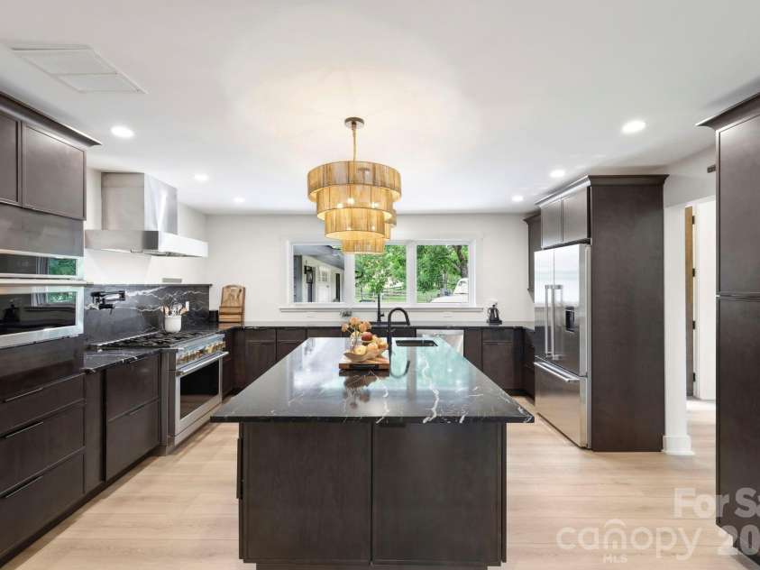 114 Cane Creek Ranch Drive, Fletcher, NC 28732.  MLS# CAR4395203, YatesRealty ID 35841. Center island, marble countertops