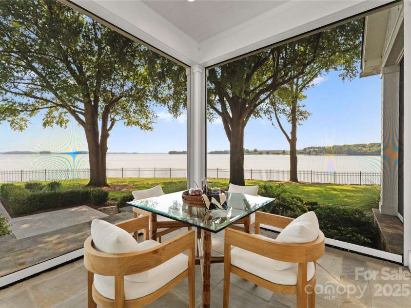 124 Wellcraft Court, Mooresville, NC 28117.  MLS# CAR4227104, YatesRealty ID 3586. Screened patio dining area.