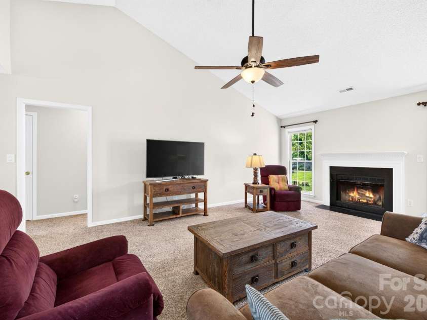 35 Meadow Pathway Drive, Fletcher, NC 28732.  MLS# CAR4395042, YatesRealty ID 35871. FP is woodburning - digitized fire in photo