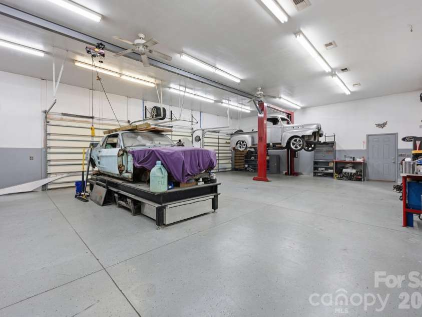 132 Monarch Lane, Mooresville, NC 28115.  MLS# CAR4391250, YatesRealty ID 35878. Auto Enthusiast's Dream Garage, Heated/Cooled and Plumbed for Future Half Bath