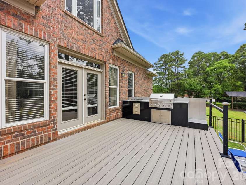 132 Monarch Lane, Mooresville, NC 28115.  MLS# CAR4391250, YatesRealty ID 35878. Back of Home and Deck