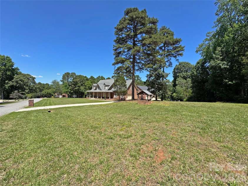 132 Monarch Lane, Mooresville, NC 28115.  MLS# CAR4391250, YatesRealty ID 35878. Small Neighborhood with Estate Sized Lots for Nice Privacy