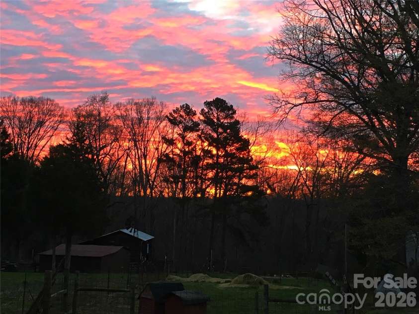 132 Monarch Lane, Mooresville, NC 28115.  MLS# CAR4391250, YatesRealty ID 35878. Sunset Views from the Deck