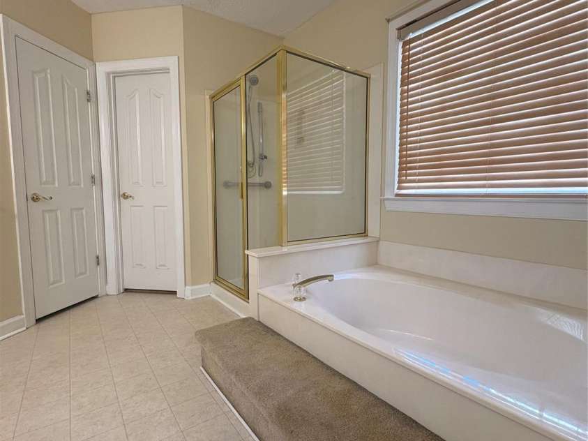 5828 Swanston Drive, Charlotte, NC 28269.  MLS# CAR4333128, YatesRealty ID 3588. Downstairs Master Bathroom