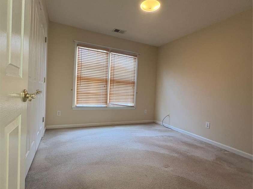 5828 Swanston Drive, Charlotte, NC 28269.  MLS# CAR4333128, YatesRealty ID 3588. Upstairs 2nd Bedroom