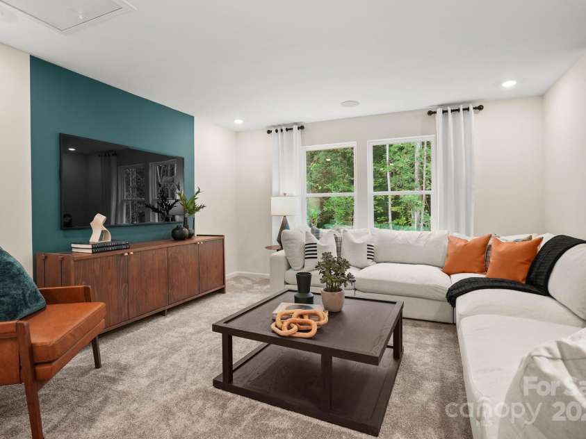 6016 Chumbley Point Road, Charlotte, NC 28215.  MLS# CAR4238045, YatesRealty ID 3588. Representative photo of loft upstairs