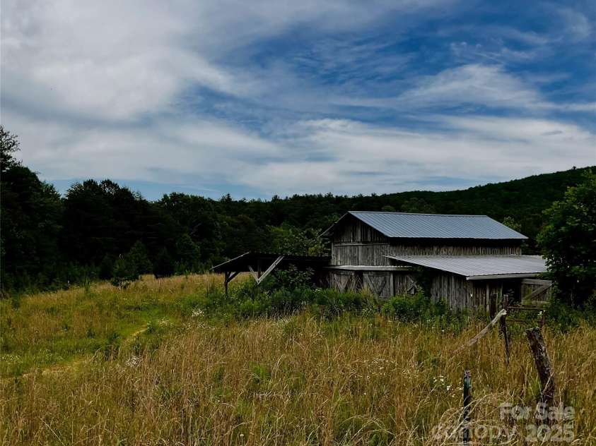 4282 Mount Gilead Church Road, Connelly Springs, NC 28612.  MLS# CAR4272301, YatesRealty ID 3589. Main barn, looking towards back of property