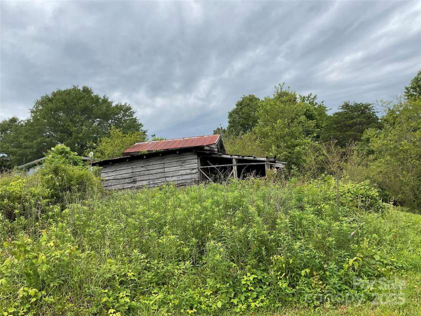 4282 Mount Gilead Church Road, Connelly Springs, NC 28612.  MLS# CAR4272301, YatesRealty ID 3589. Smaller, secondary barn immediately behind house