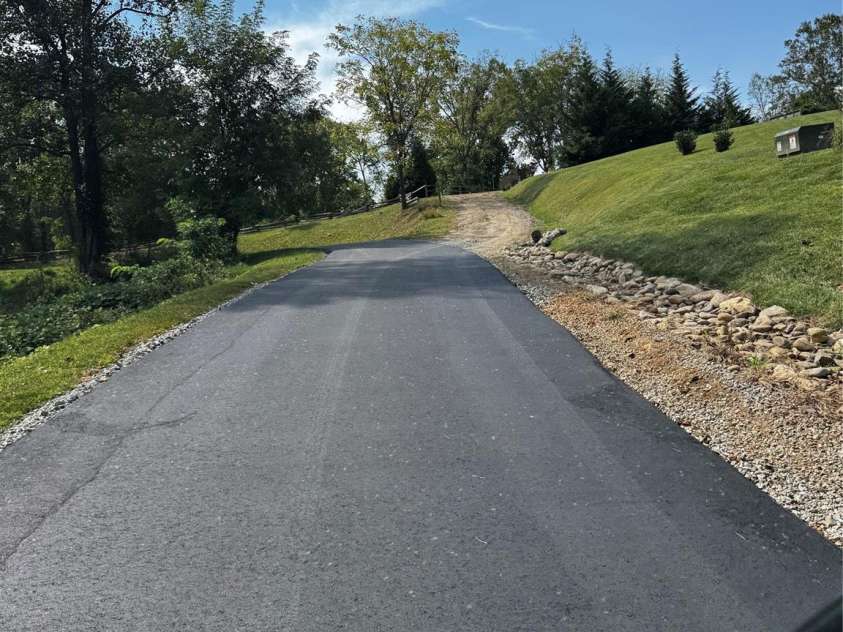 70 Heslar Way, Marshall, NC 28753.  MLS# CAR4388058, YatesRealty ID 35900. Brand new paved road for easy access