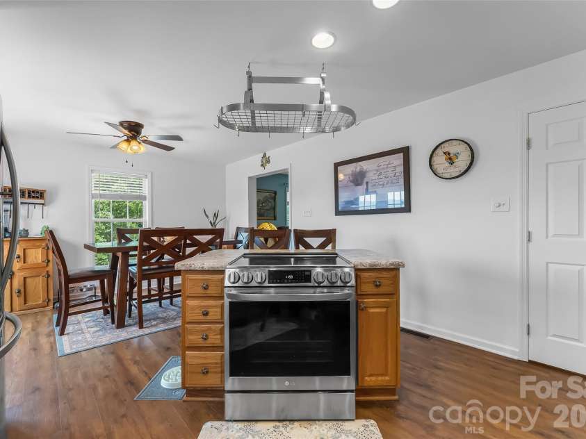 70 Heslar Way, Marshall, NC 28753.  MLS# CAR4388058, YatesRealty ID 35900. Center island stove