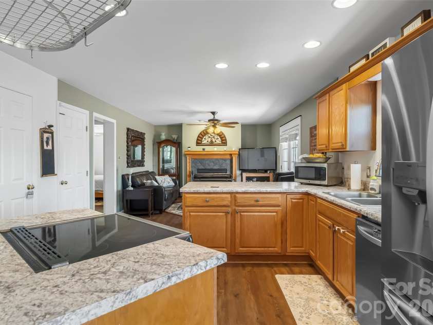 70 Heslar Way, Marshall, NC 28753.  MLS# CAR4388058, YatesRealty ID 35900. Large Kitchen with real wood cabinets
