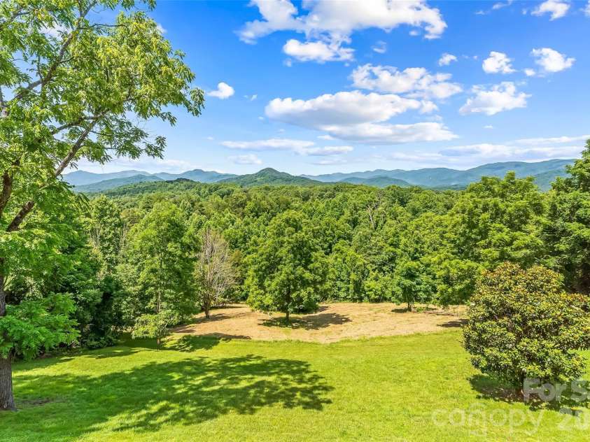 70 Heslar Way, Marshall, NC 28753.  MLS# CAR4388058, YatesRealty ID 35900. More cleared areas for additional building