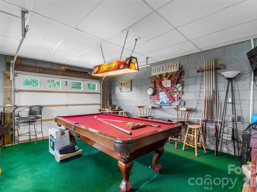 70 Heslar Way, Marshall, NC 28753.  MLS# CAR4388058, YatesRealty ID 35900. Pool table in oversized garage will convey with acceptable offer