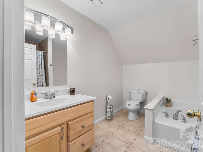 70 Heslar Way, Marshall, NC 28753.  MLS# CAR4388058, YatesRealty ID 35900. Second bath upper level