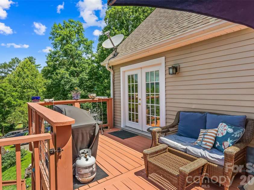 70 Heslar Way, Marshall, NC 28753.  MLS# CAR4388058, YatesRealty ID 35900. The deck has been completely restained
