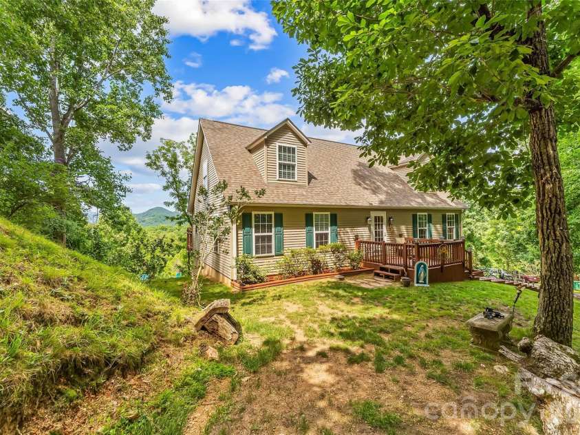 70 Heslar Way, Marshall, NC 28753.  MLS# CAR4388058, YatesRealty ID 35900. The Front View this house is well maintained on 10.02acres