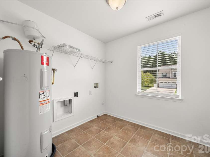 3017 Rhododendron Place, Clover, SC 29710.  MLS# CAR4394093, YatesRealty ID 35907. Laundry room