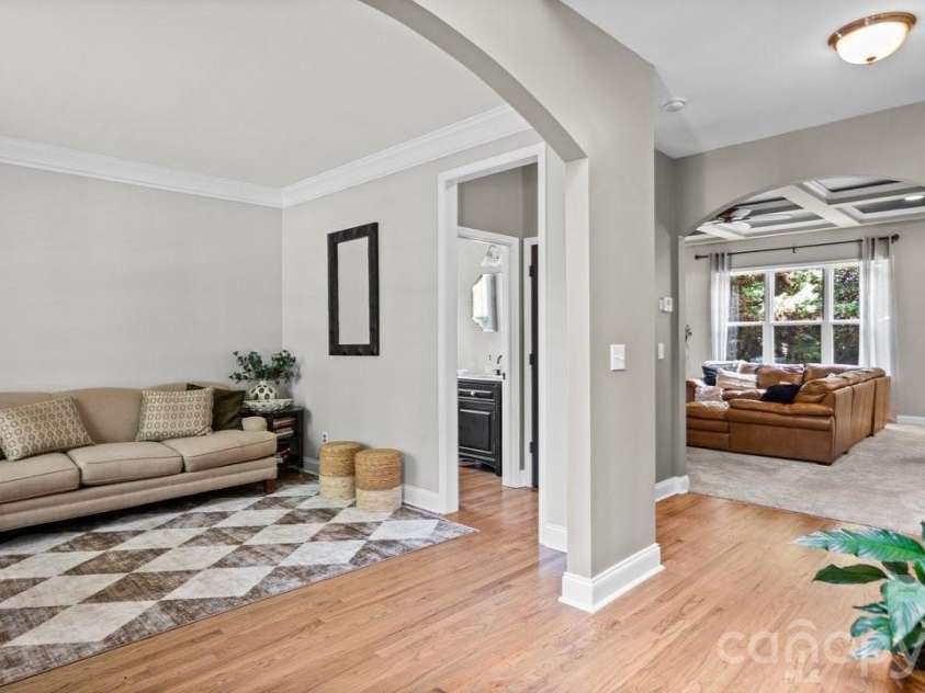 10209 Treetop Lane, Cornelius, NC 28031.  MLS# CAR4387634, YatesRealty ID 35909. Living room/ flex space
